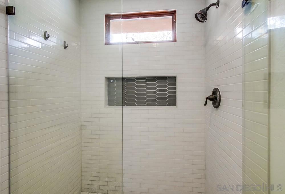 12128 Eagle Street San Diego, CA 92131 - Photo 24 of 37 a bathroom with a shower