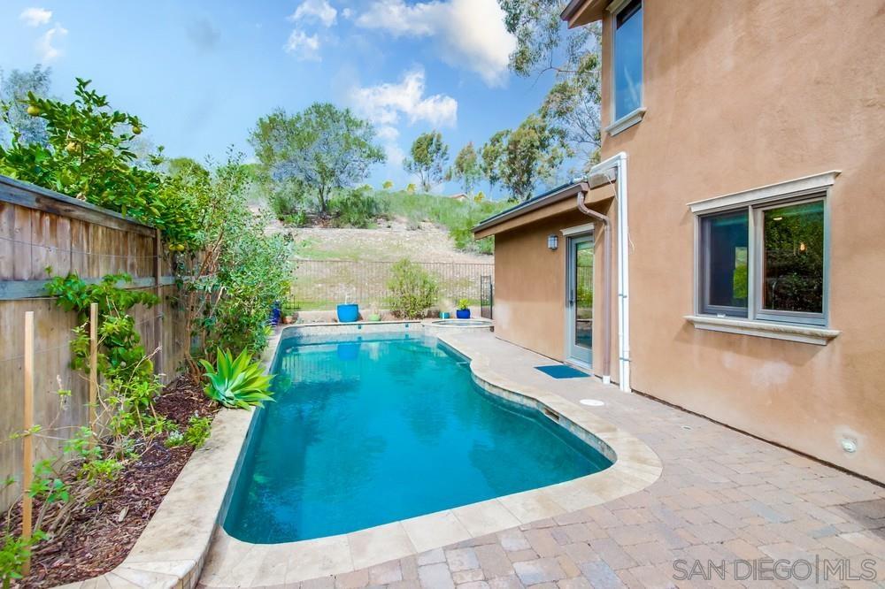 12128 Eagle Street San Diego, CA 92131 - Photo 33 of 37 a view of a house with backyard and sitting area