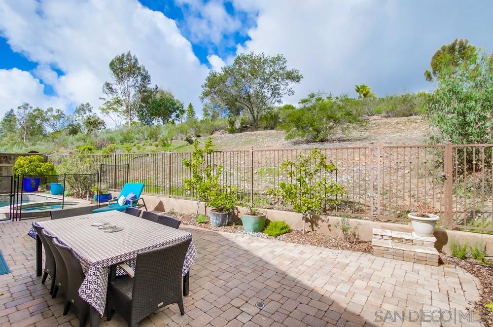 12128 Eagle Street San Diego, CA 92131 - Photo 34 of 37 a view of a patio with couches and potted plants