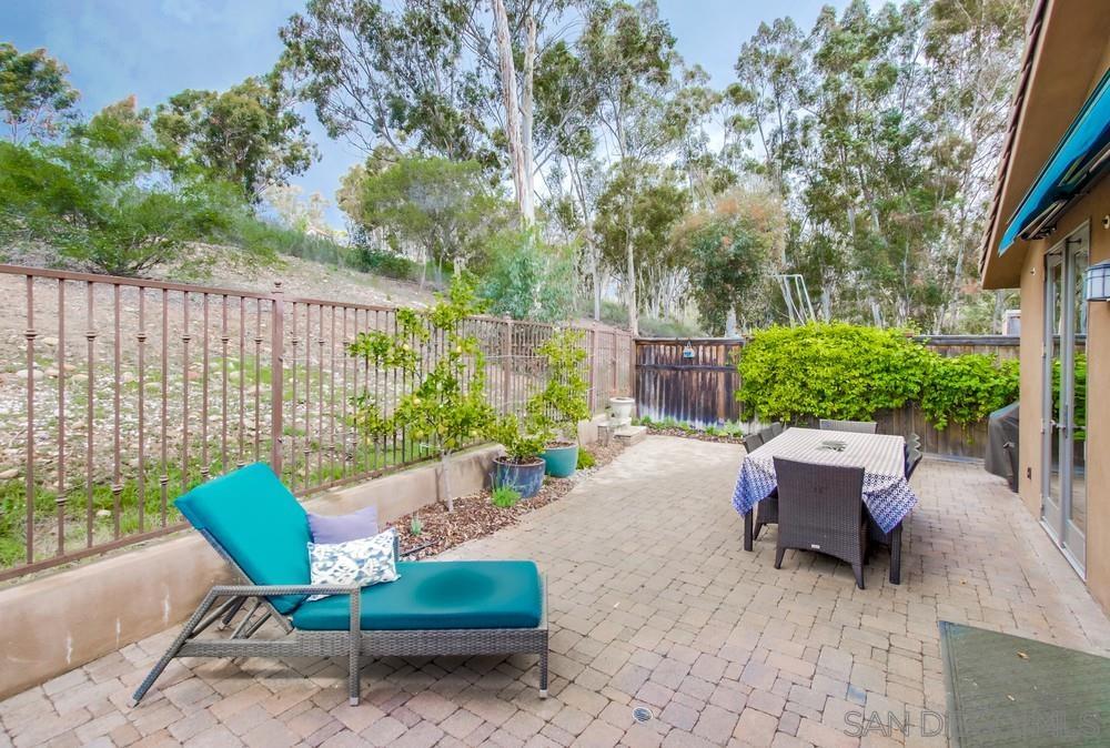 12128 Eagle Street San Diego, CA 92131 - Photo 35 of 37 a backyard of a house with outdoor seating