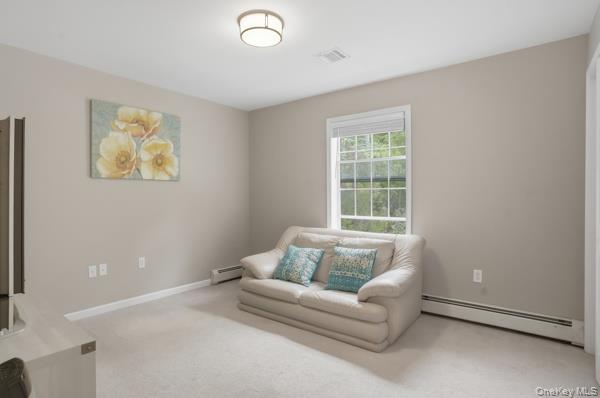 29 Hickory Hill Road Newburgh, NY 12550 - Photo 42 of 47 a living room with furniture and a window