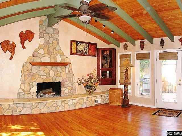 1620 Belford Road Reno, NV 89509 - Photo 2 of 9 a living room with furniture and a fireplace