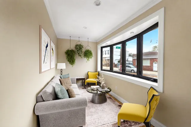 a view of a car parked in front of a house