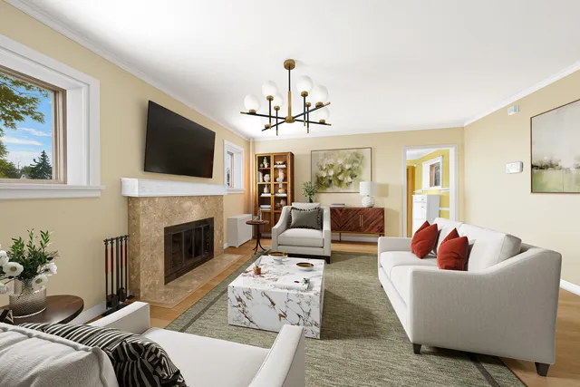 a view of a hallway with wooden floor and furniture