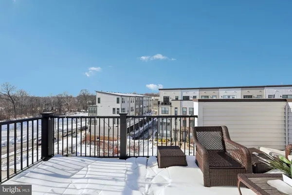 a view of balcony with furniture