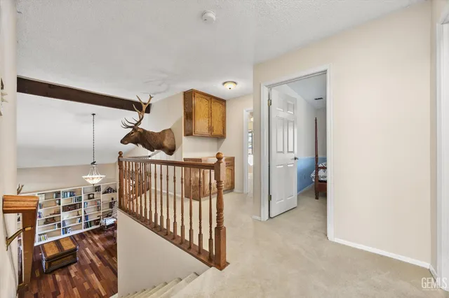 a bathroom with a granite countertop sink mirror and double