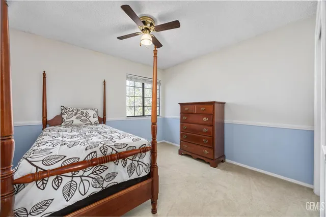 a view of a porch with furniture and garden