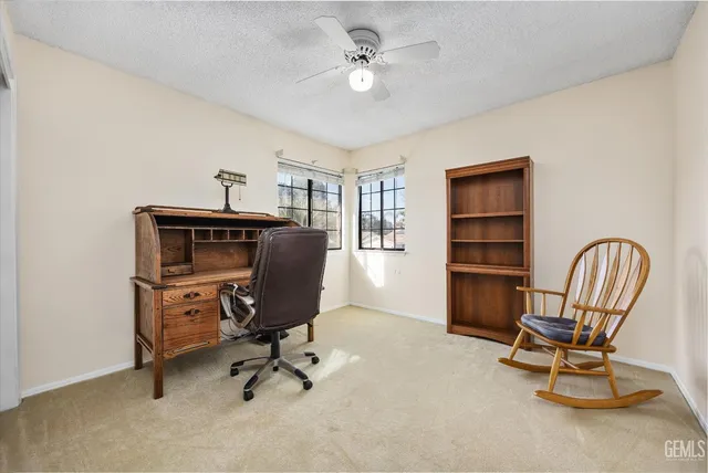 a view of a wooden chairs with a table and chairs