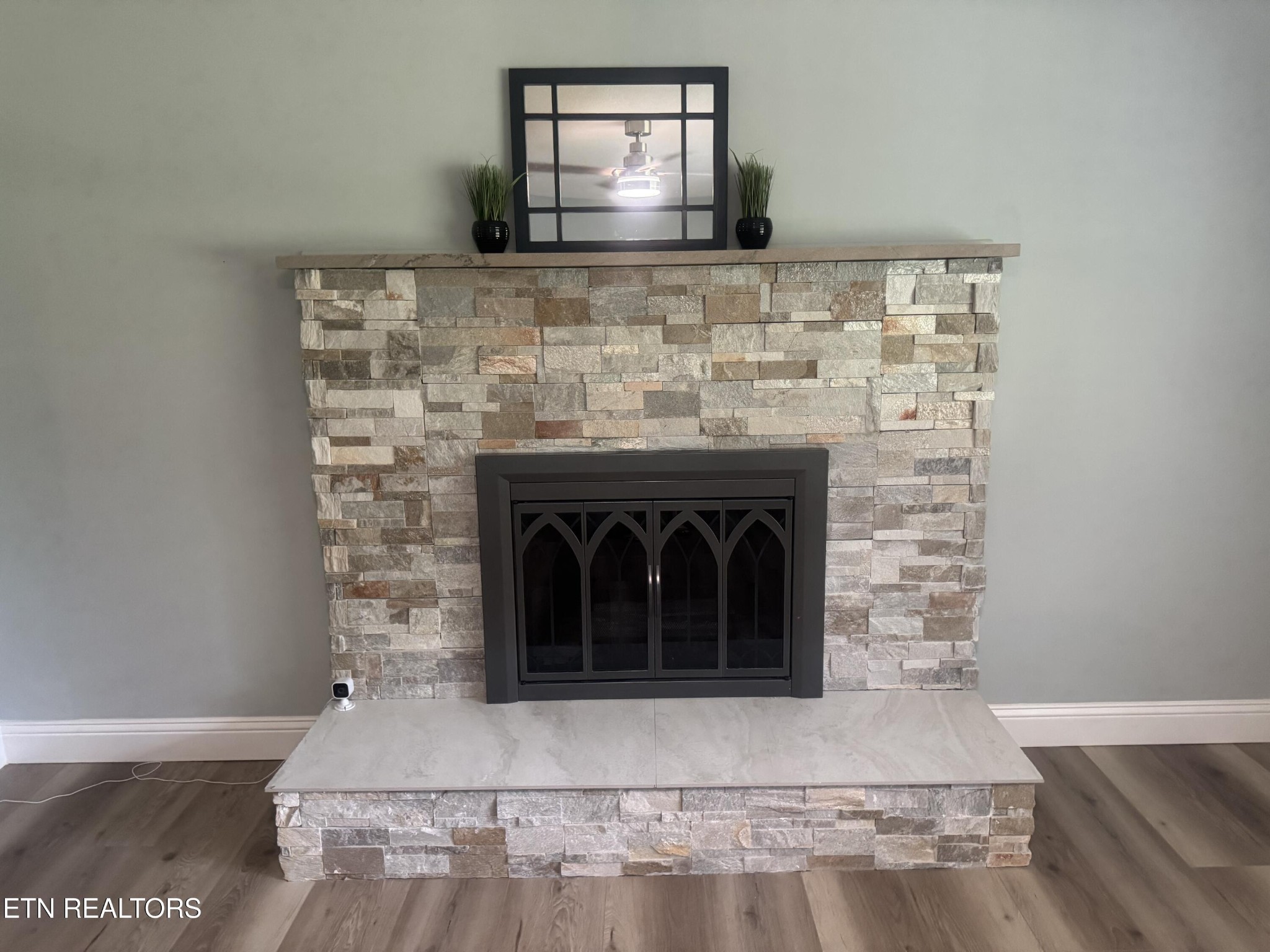 3341 West Wolf Valley Road Clinton, TN 37716 - Photo 33 of 41 a living room with a fireplace