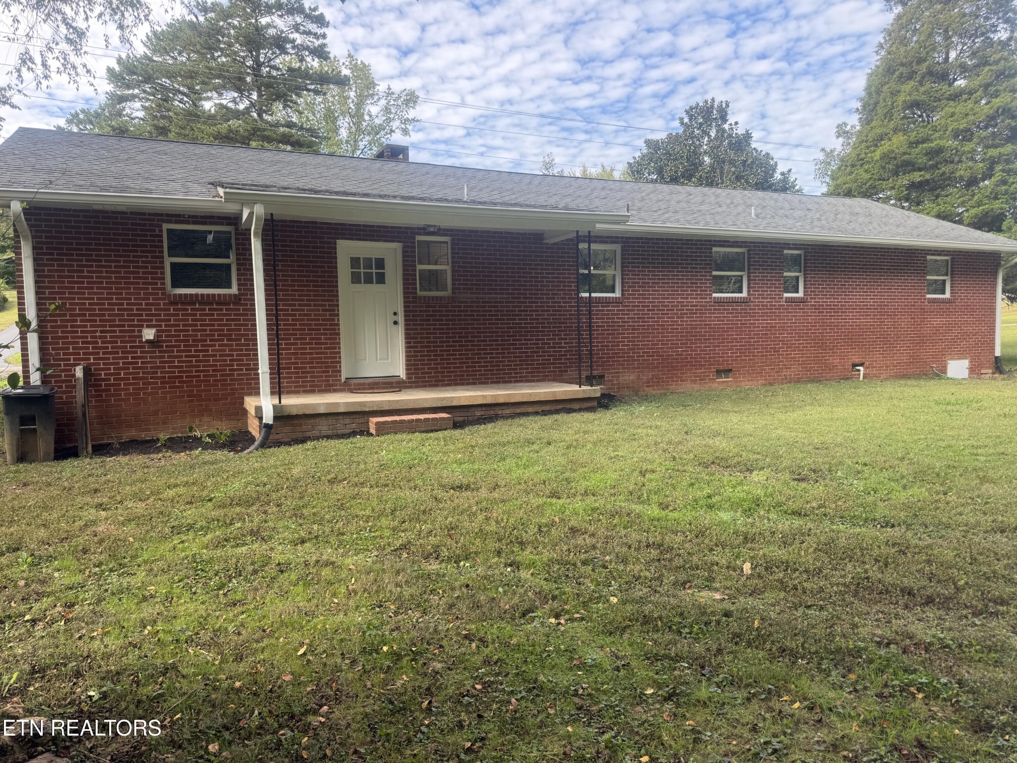 3341 West Wolf Valley Road Clinton, TN 37716 - Photo 36 of 41 a backyard of a house with lots of green space
