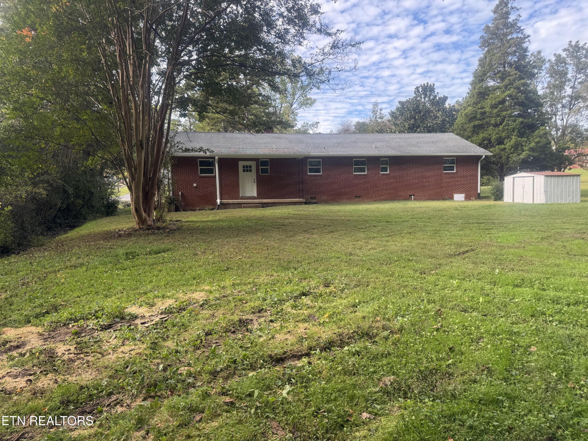 3341 West Wolf Valley Road Clinton, TN 37716 - Photo 41 of 41 a view of a house with a yard