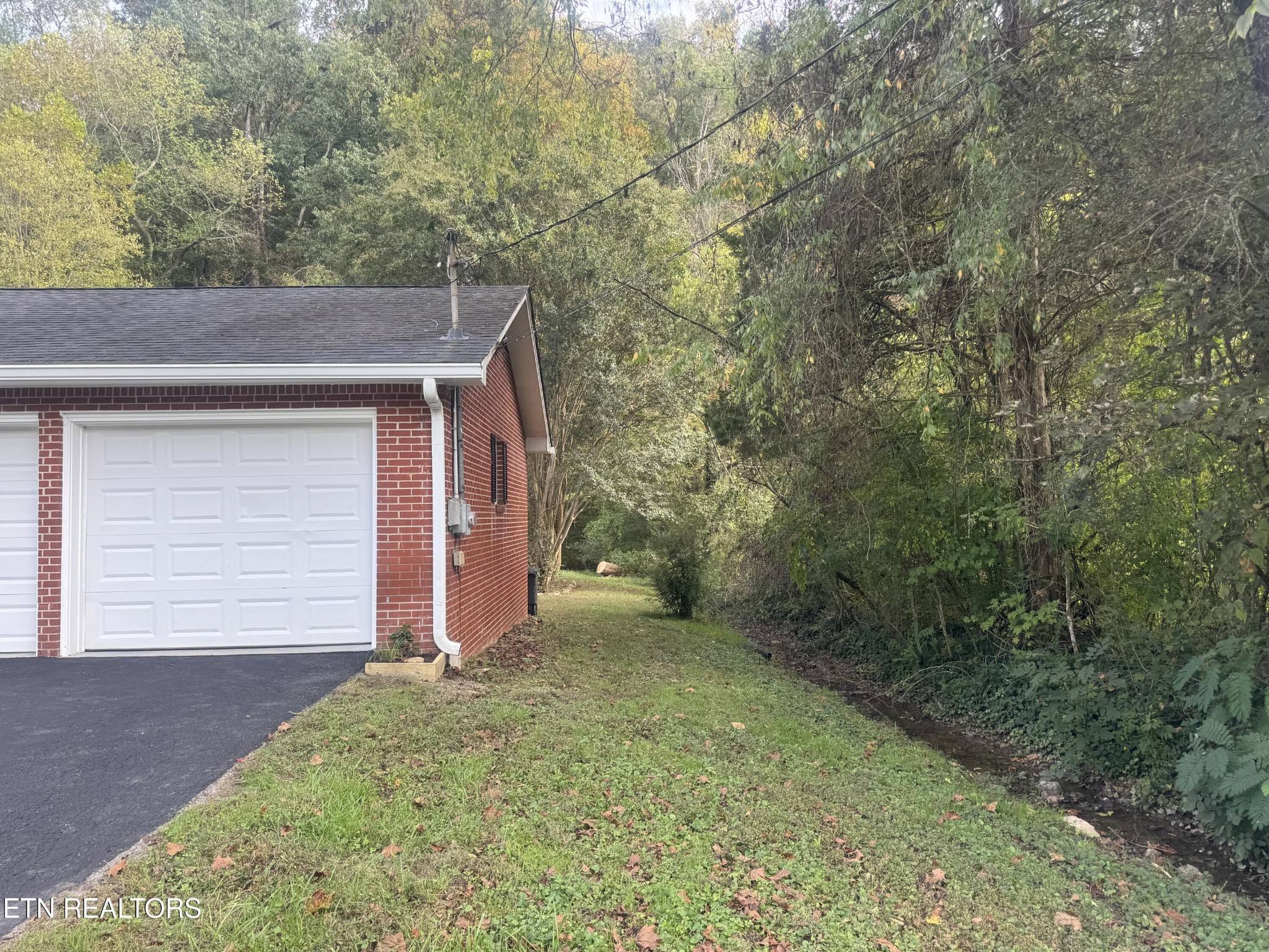 3341 West Wolf Valley Road Clinton, TN 37716 - Photo 5 of 41 a view of a backyard