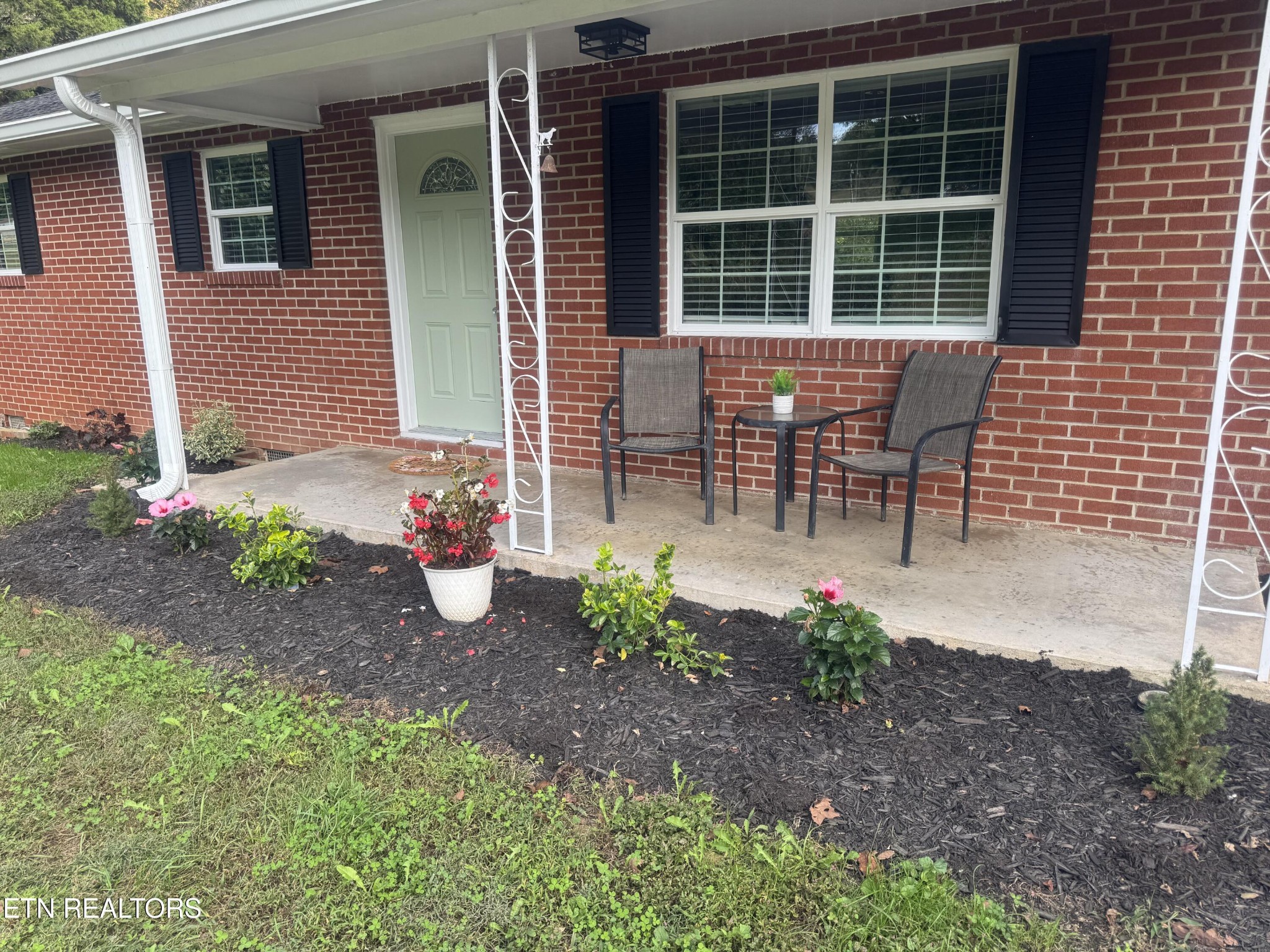 3341 West Wolf Valley Road Clinton, TN 37716 - Photo 6 of 41 a view of a house with a yard and sitting area