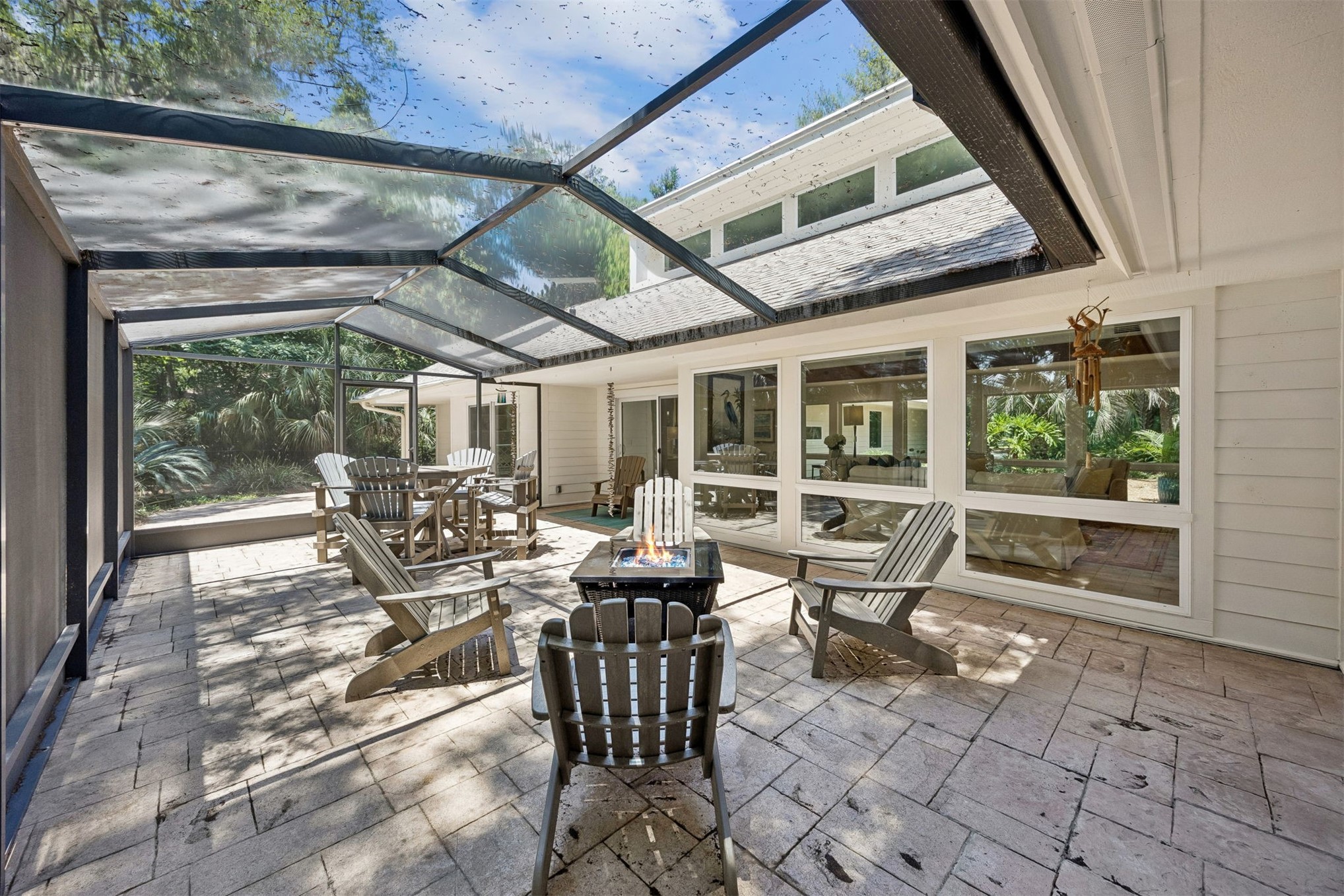 123 Bitternut Road Fernandina Beach, FL 32034 - Photo 6 of 87 Large screened-in patio is perfect for casual lunches or to wind down around a fire pit.