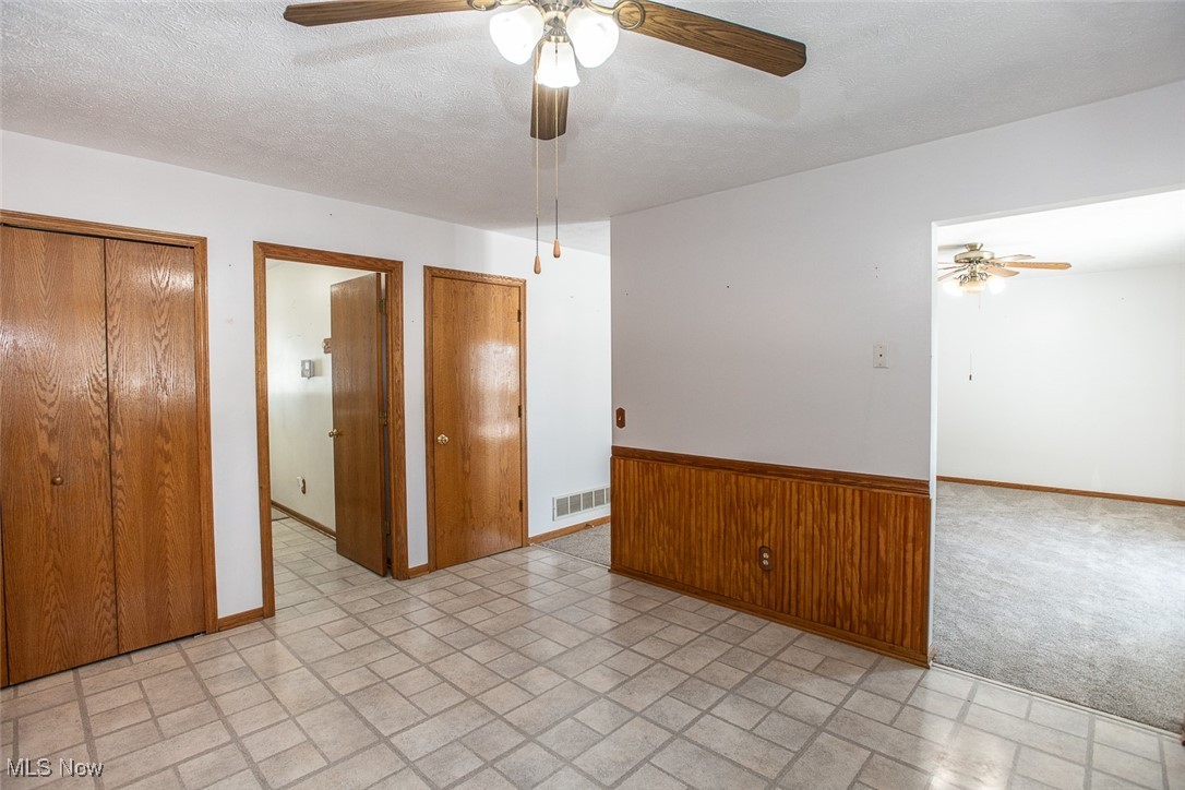 2624 Lester Road Medina, OH 44256 - Photo 15 of 50 Eat in Kitchen with Stainless Steel appliances range hood and vinyl flooring and 2 pantries