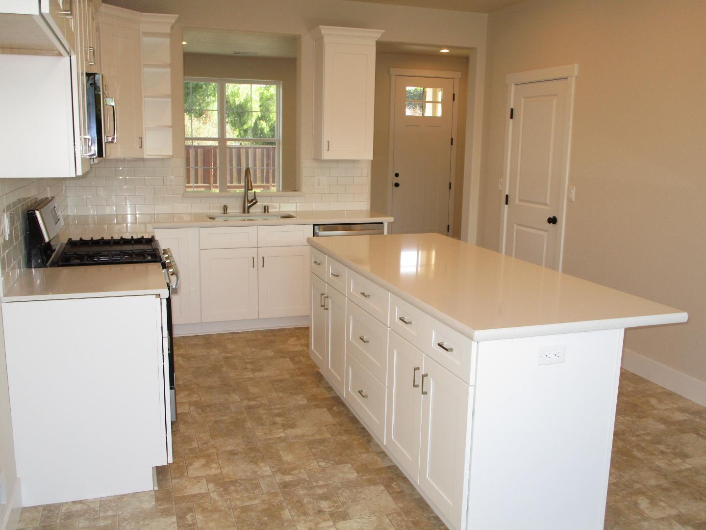 159 Terrace Drive Greenfield, CA 93927 - Photo 6 of 23 a spacious bathroom with a double vanity sink a mirror and a bathtub