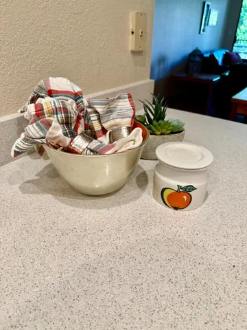 a room with a table and chairs