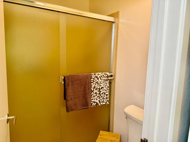 a close up of a wall with a painting on the wall