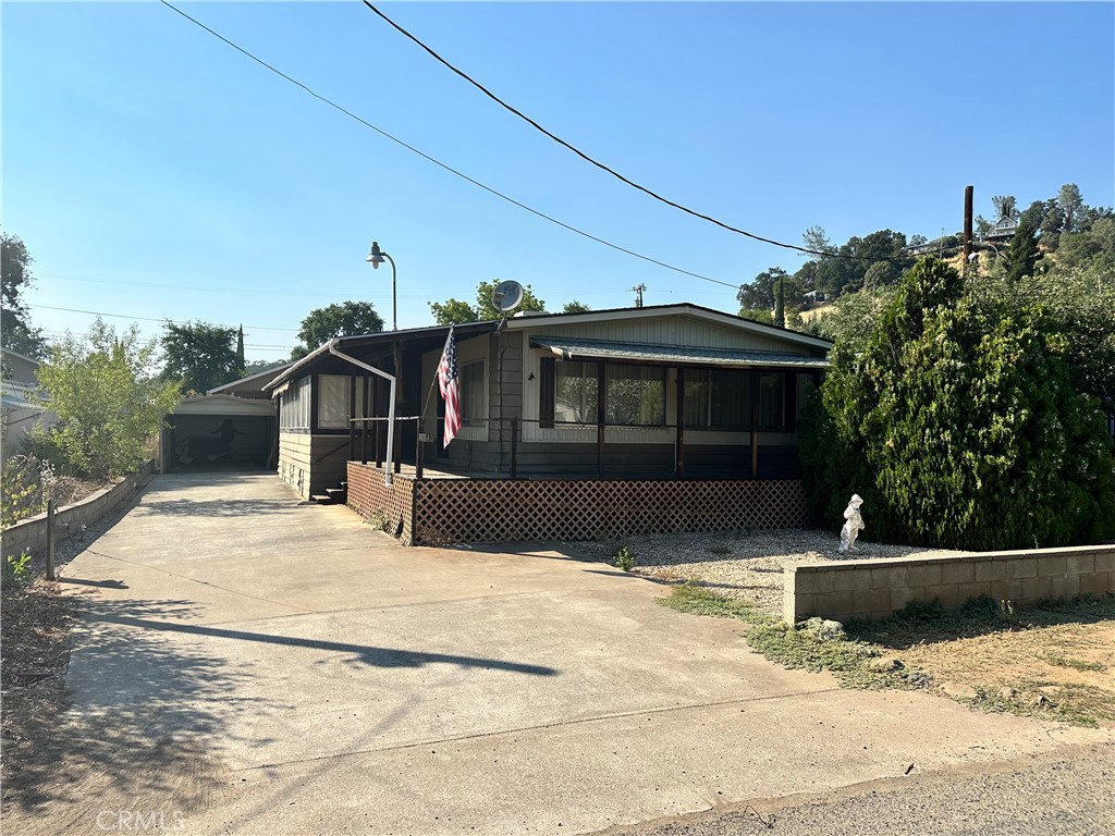 2843 Lakeview Drive Nice, CA 95464 - Photo 2 of 20 a front view of a house with a yard