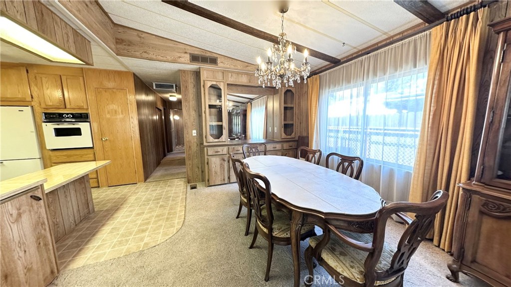 2843 Lakeview Drive Nice, CA 95464 - Photo 6 of 20 a view of a dining room with furniture window and outside view