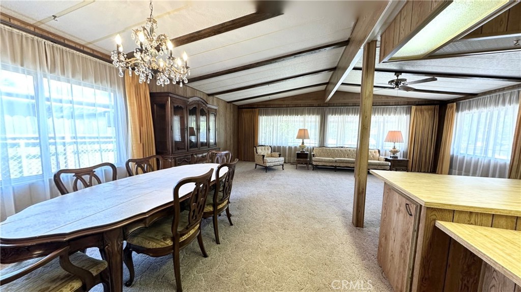 2843 Lakeview Drive Nice, CA 95464 - Photo 7 of 20 a view of a dining room with furniture window and wooden floor