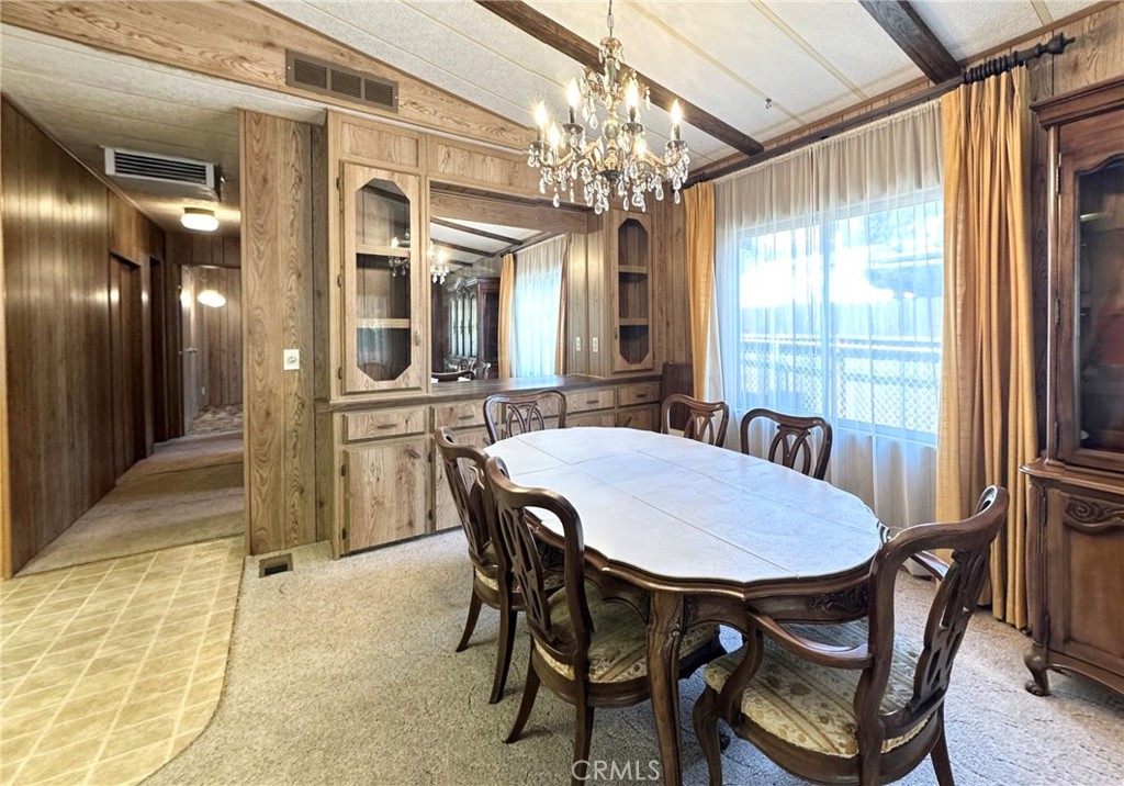 2843 Lakeview Drive Nice, CA 95464 - Photo 8 of 20 a view of a dining room with furniture window and outside view