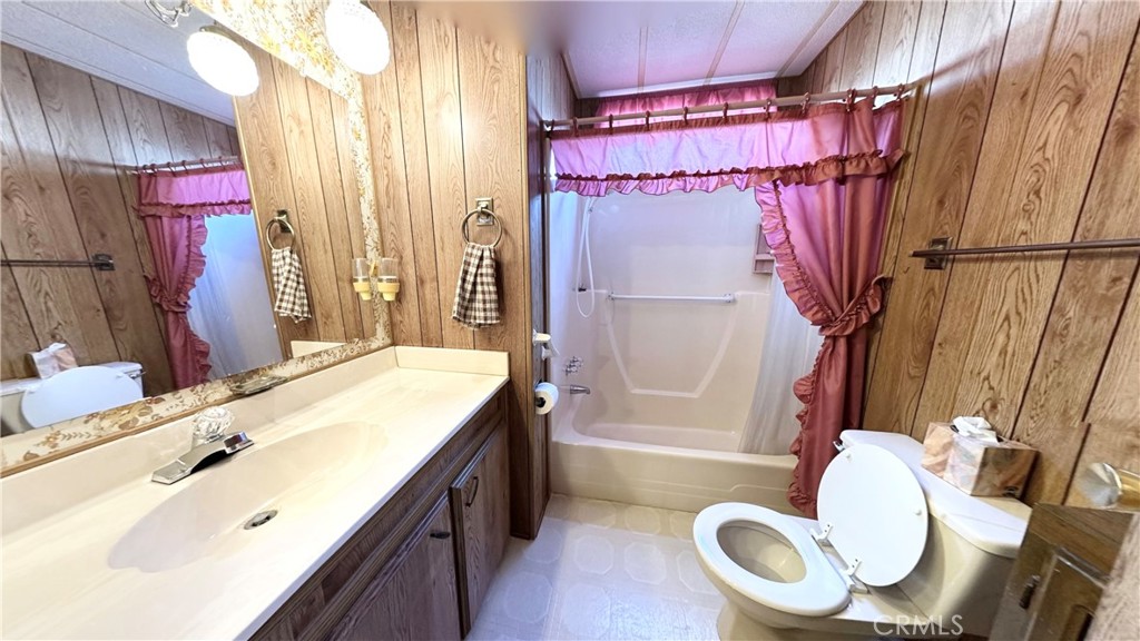 2843 Lakeview Drive Nice, CA 95464 - Photo 10 of 20 a bathroom with a sink toilet and shower
