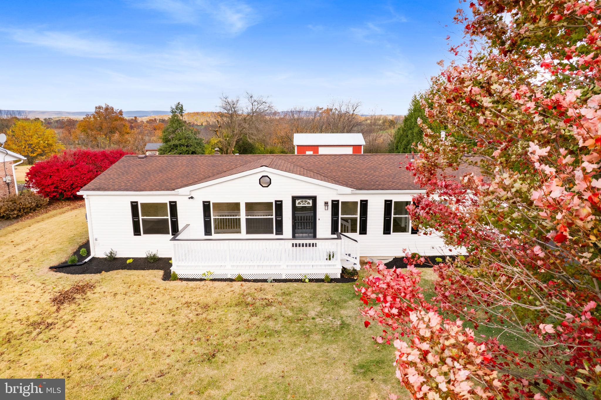 2337 Brownsville Road Robesonia, PA 19551 - Photo 2 of 57 a front view of a house with a yard