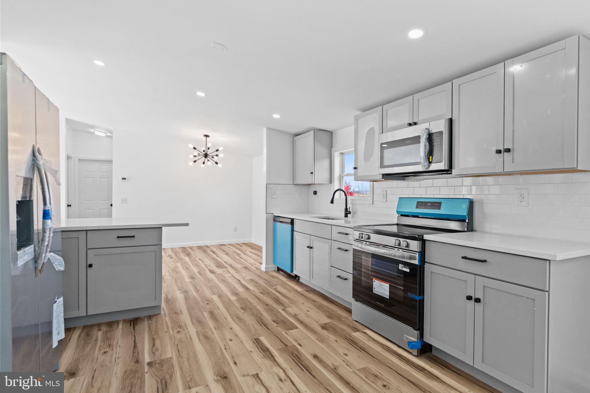 2337 Brownsville Road Robesonia, PA 19551 - Photo 24 of 57 a kitchen with cabinets appliances and a counter space