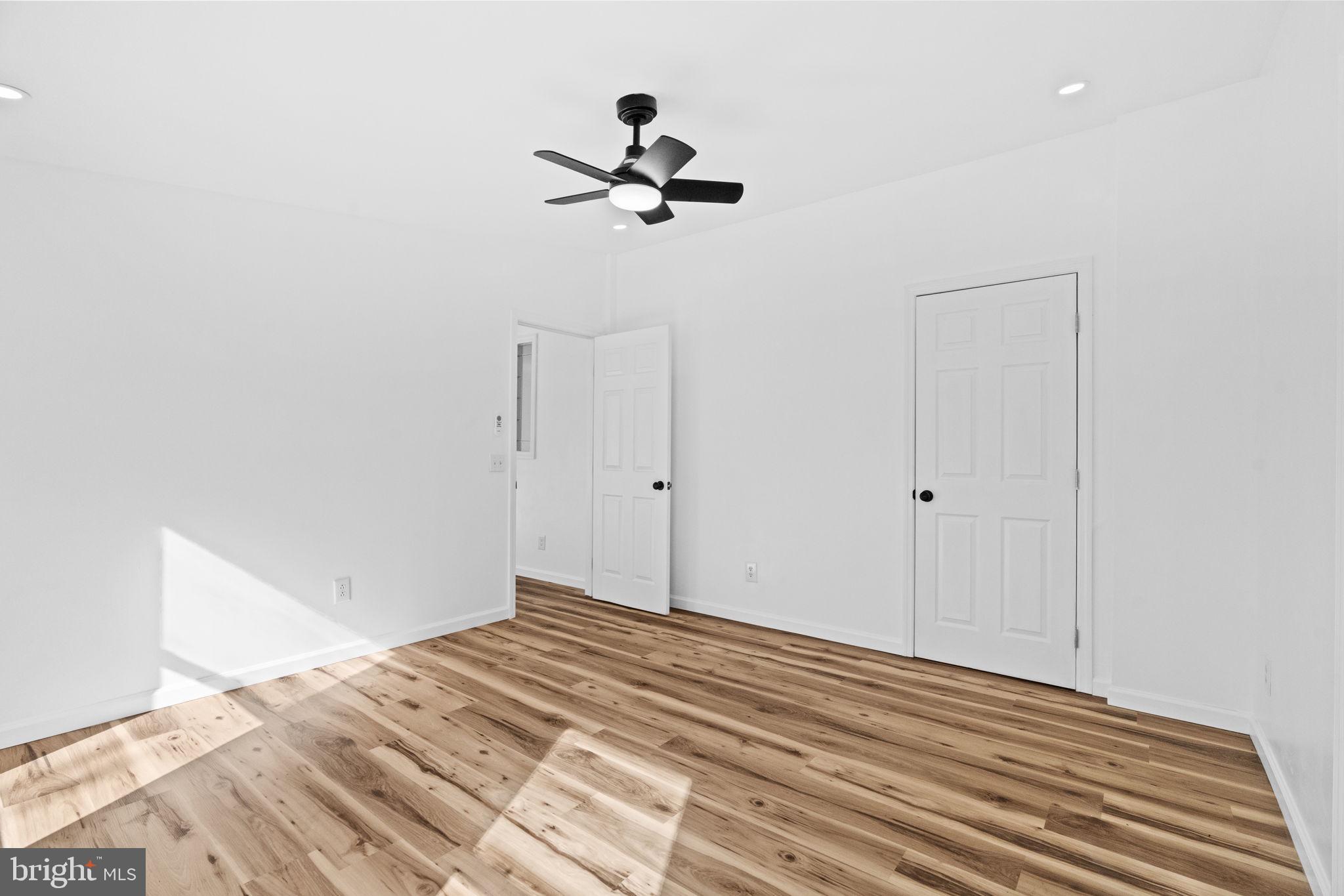 2337 Brownsville Road Robesonia, PA 19551 - Photo 30 of 57 a view of a room with wooden floor and ceiling fan