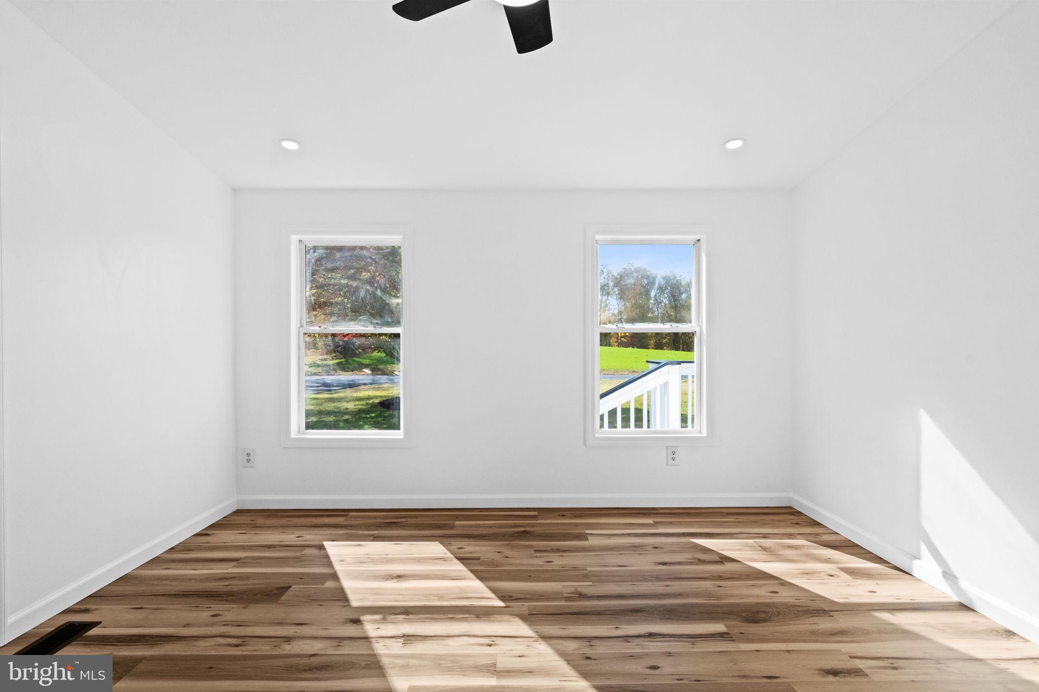 2337 Brownsville Road Robesonia, PA 19551 - Photo 31 of 57 an empty room with window and wooden floor