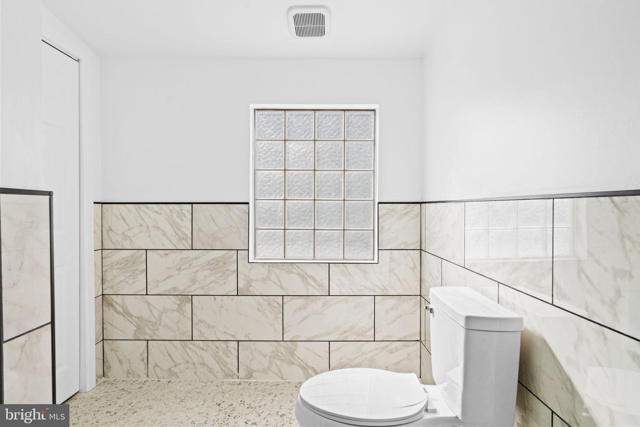 2337 Brownsville Road Robesonia, PA 19551 - Photo 35 of 57 a bathroom with a sink toilet and shower