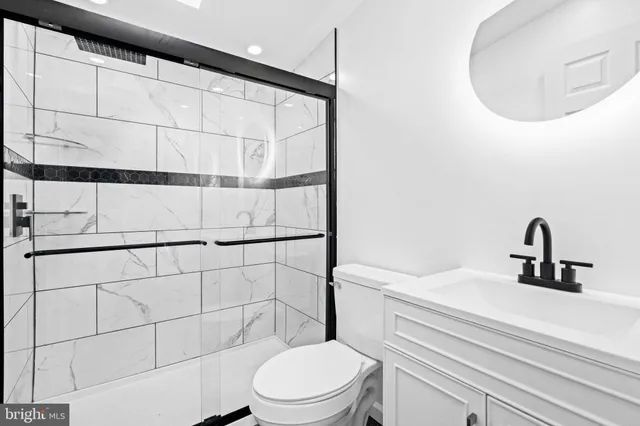 a view of a lake with a house in the background