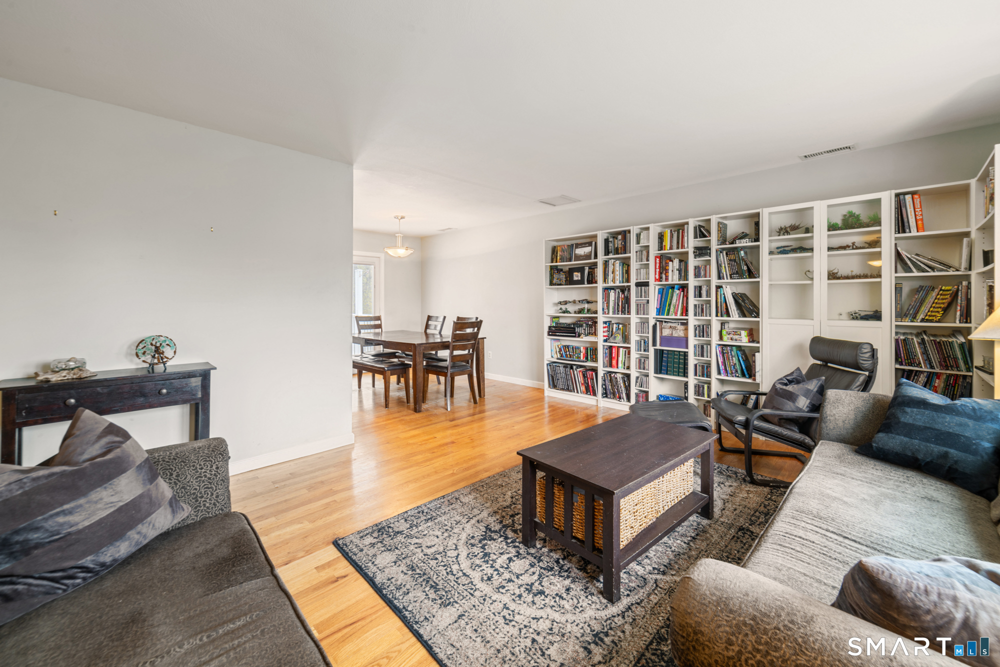 51 Sky View Circle Hamden, CT 06514 - Photo 11 of 40 a living room with furniture and a table