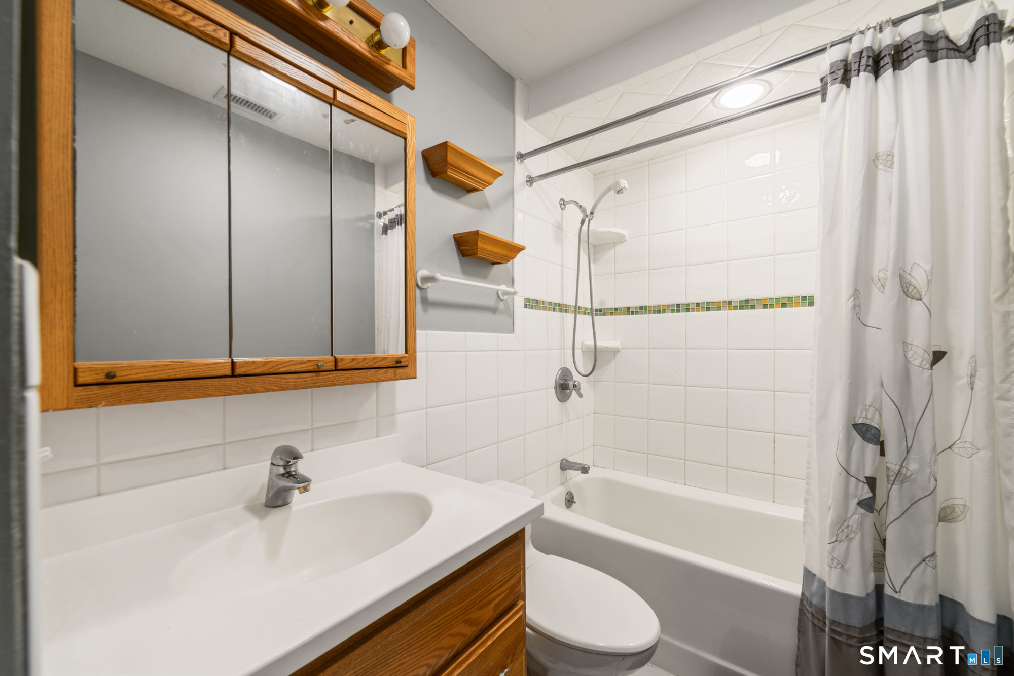 51 Sky View Circle Hamden, CT 06514 - Photo 13 of 40 a bathroom with a sink toilet and shower