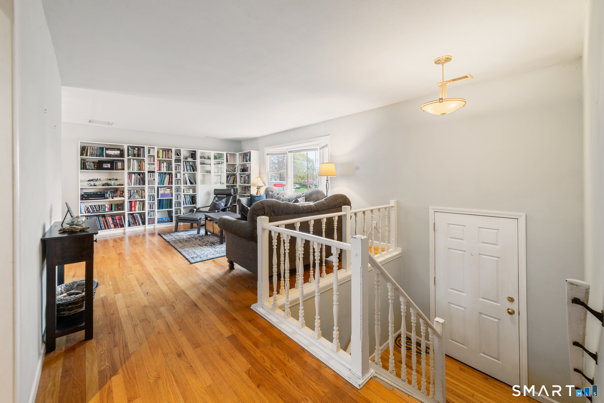 51 Sky View Circle Hamden, CT 06514 - Photo 2 of 40 a living room with furniture and a wooden floor