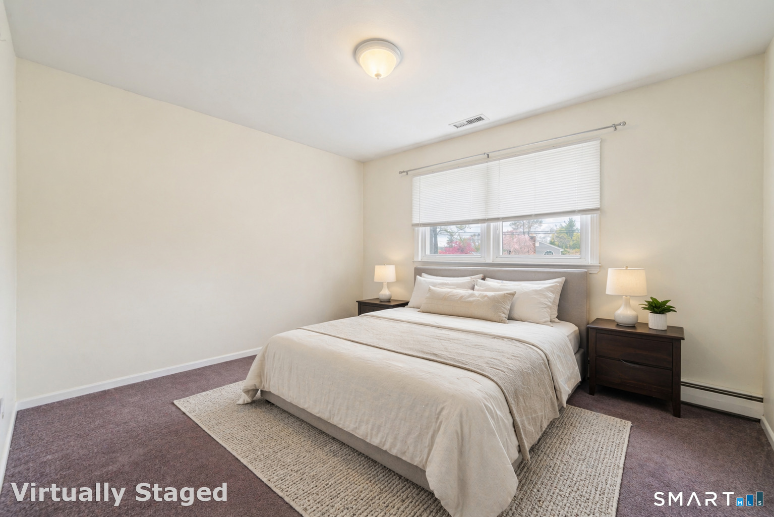 51 Sky View Circle Hamden, CT 06514 - Photo 22 of 40 a bedroom with a bed and a window