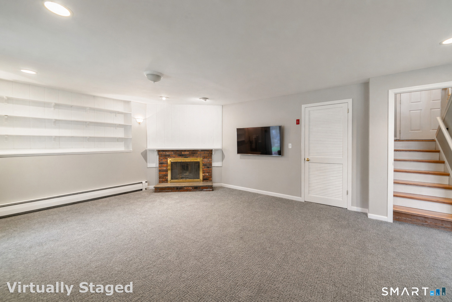 51 Sky View Circle Hamden, CT 06514 - Photo 28 of 40 a view of a livingroom with an empty space and a kitchen