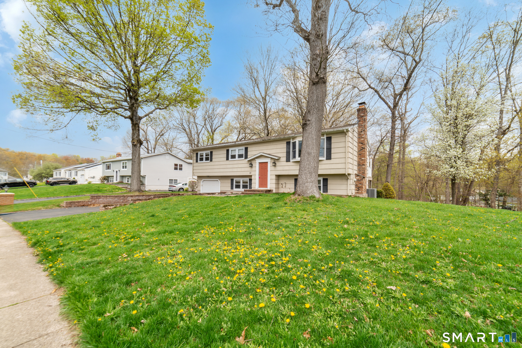 51 Sky View Circle Hamden, CT 06514 - Photo 37 of 40 a view of a house with a yard