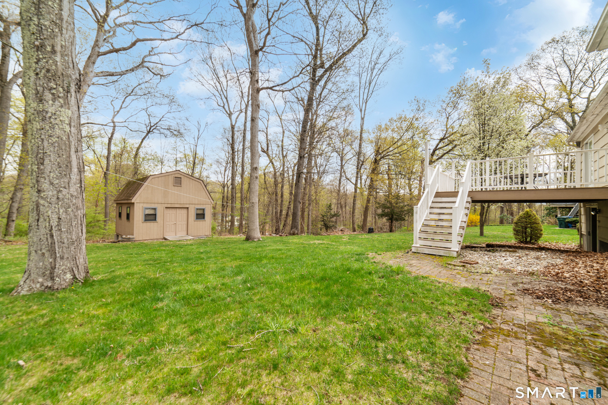 51 Sky View Circle Hamden, CT 06514 - Photo 40 of 40 a view of a house with yard and a tree