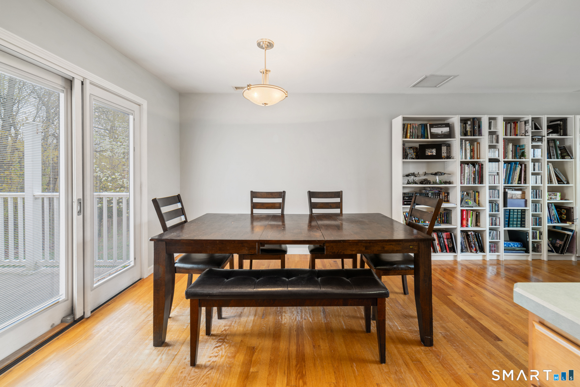 51 Sky View Circle Hamden, CT 06514 - Photo 8 of 40 a view of a dining room with furniture and wooden floor