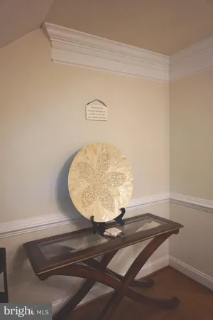 a view of a room with a wooden floor