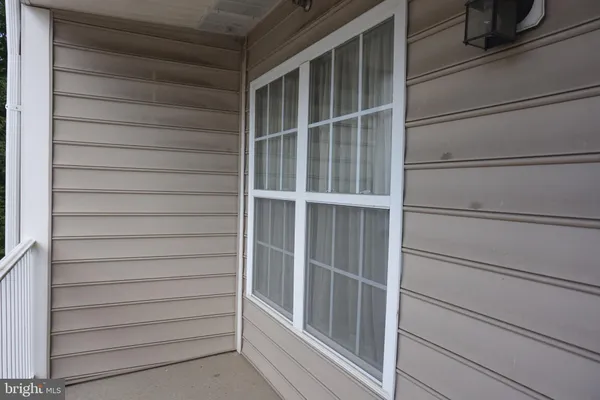 a front view of a house with a balcony