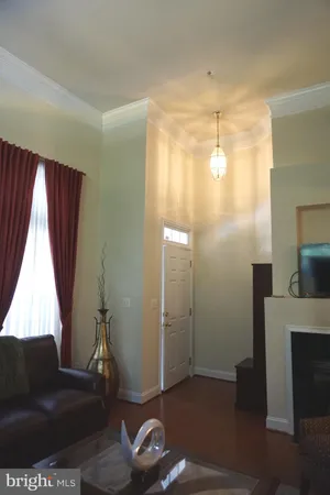 a view of entryway with furniture and a window