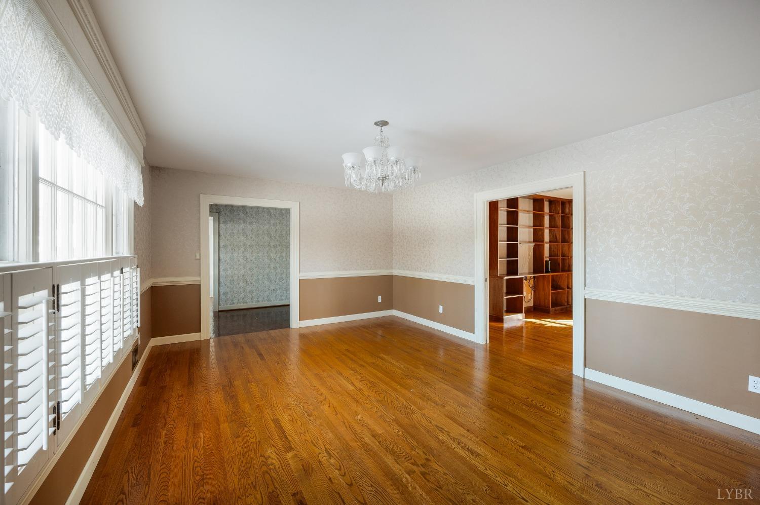 211 Sunset Drive Amherst, VA 24521 - Photo 24 of 76 wooden floor in an empty room with a window