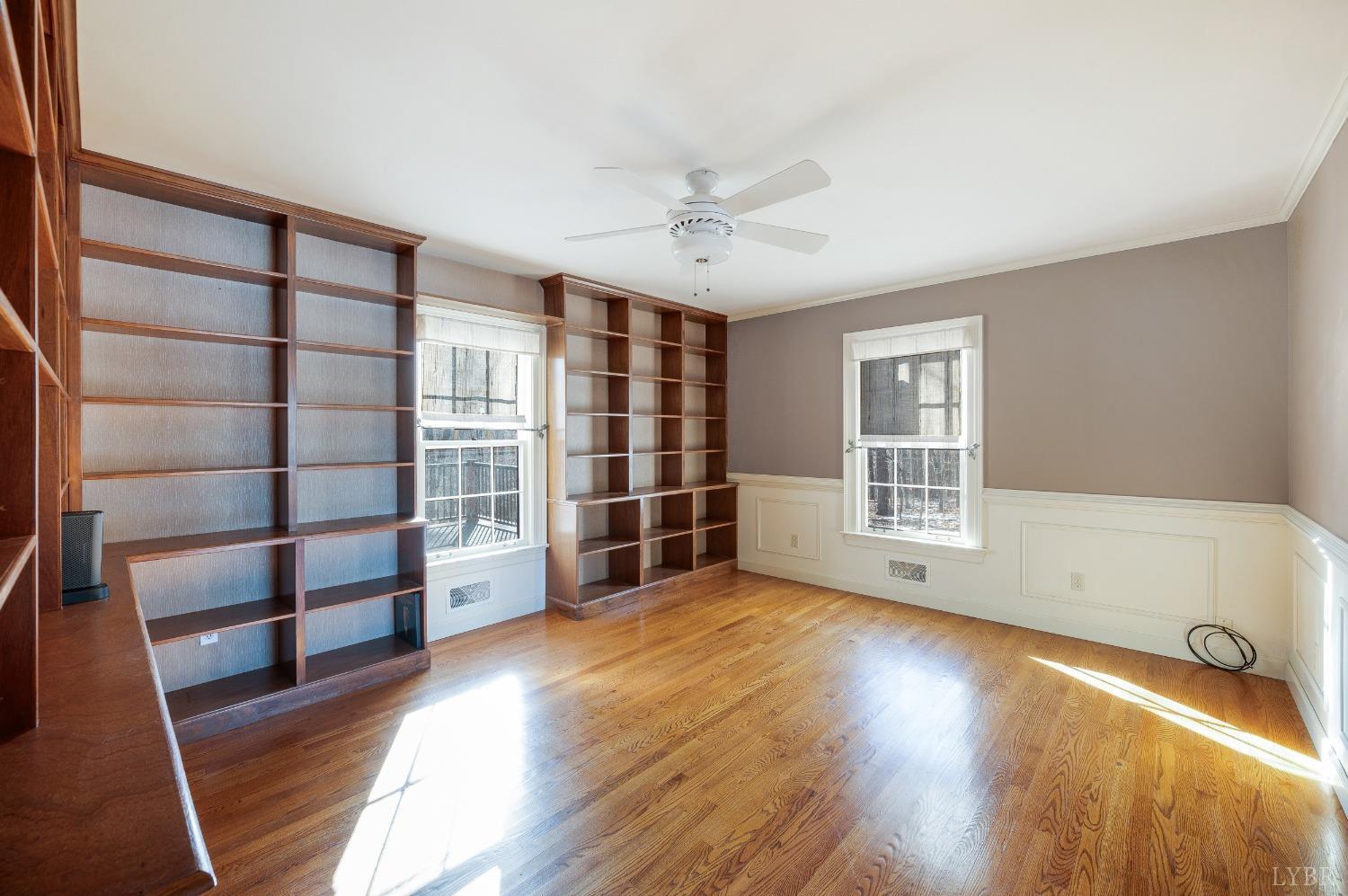 211 Sunset Drive Amherst, VA 24521 - Photo 25 of 76 a view of an empty room with a window and wooden floor