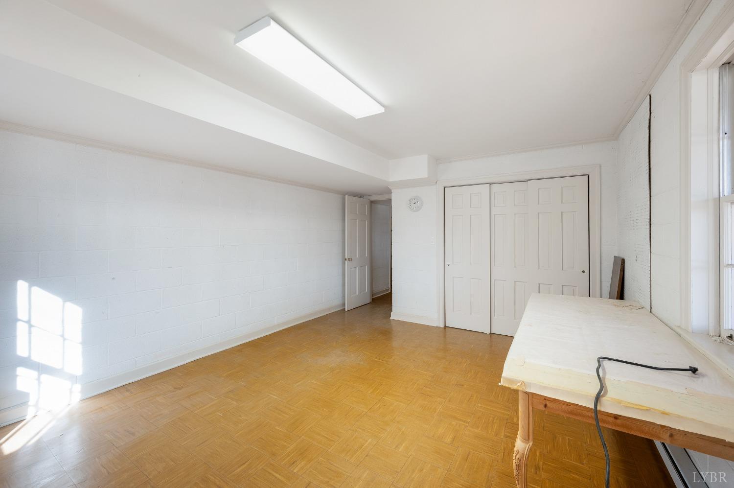 211 Sunset Drive Amherst, VA 24521 - Photo 54 of 76 a view of an empty room with a window