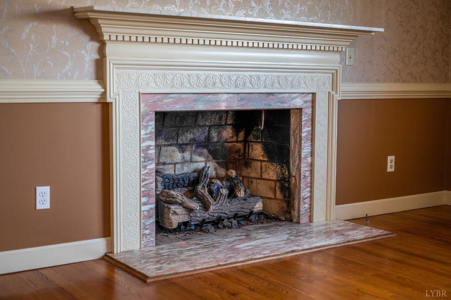211 Sunset Drive Amherst, VA 24521 - Photo 62 of 76 a view of a livingroom with wooden floor and a fireplace