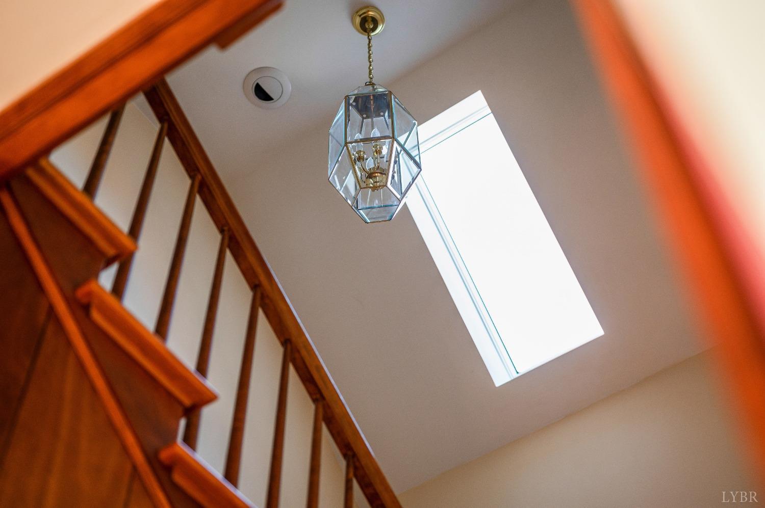 211 Sunset Drive Amherst, VA 24521 - Photo 64 of 76 a view of staircase with wooden floor and white walls
