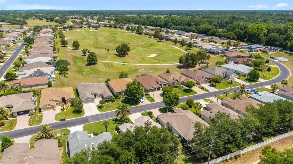 16369 Southwest 14th Avenue Road Ocala, FL 34473 - Photo 48 of 49 an aerial view of residential houses with outdoor space and river